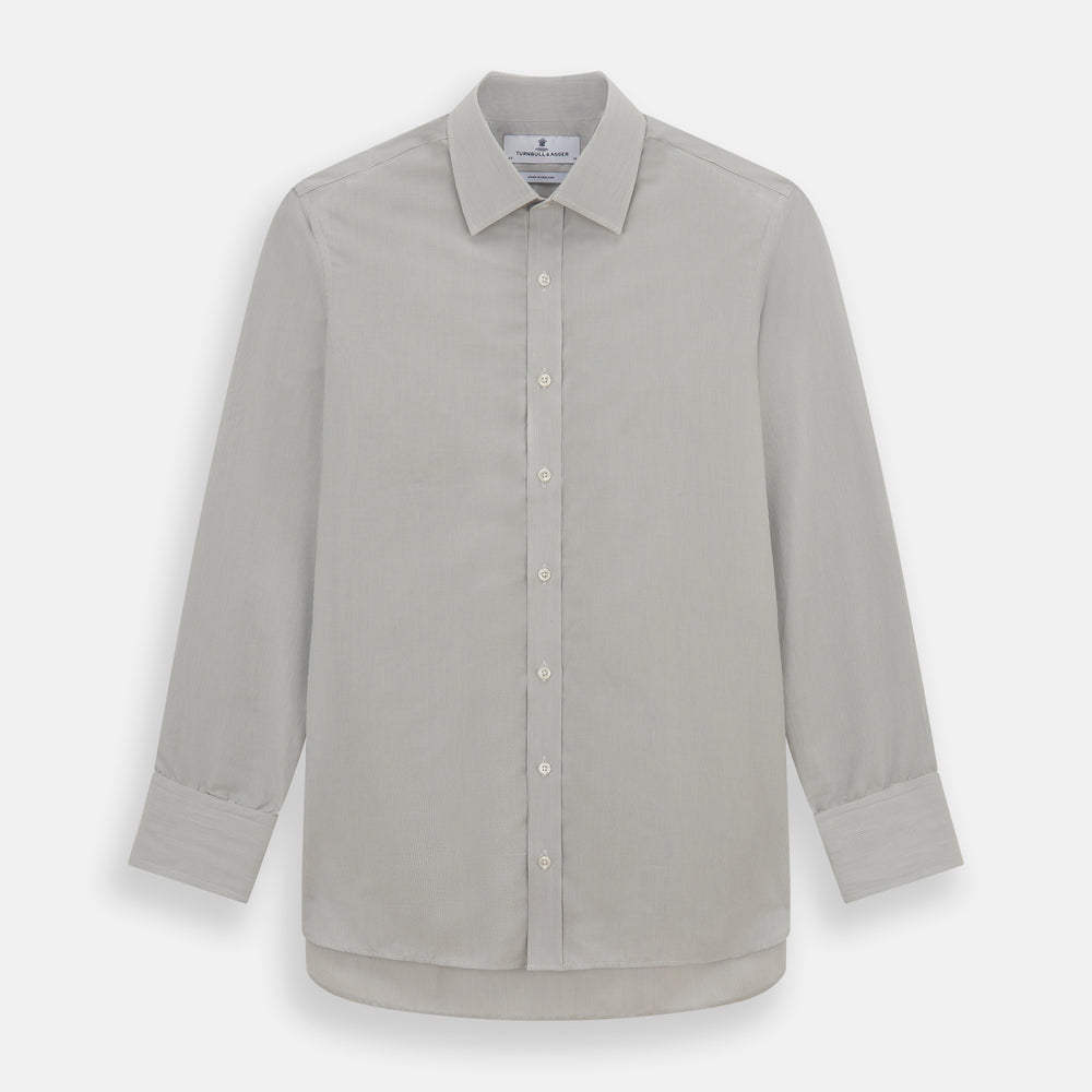 The Turnbull & Asser Pale Blue Fine Stripe Mayfair Shirt features a classic collar, white buttons, cuffs, a slightly curved hem, and subtle pale blue stripes for a formal tailored look. Displayed on a plain white background.