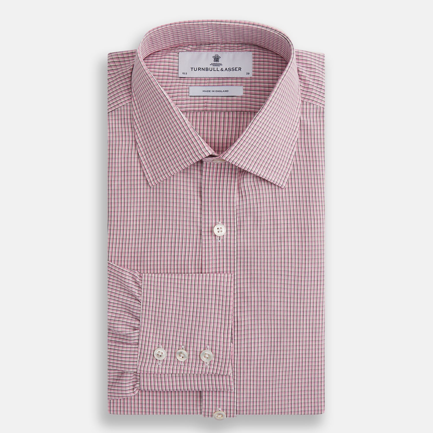 View 4 of product The Turnbull & Asser Pink Fine Graph Check Mayfair Shirt features long sleeves, breathable cotton, a pointed collar, 3-button cuffs, white buttons, and a red and white check pattern—shown on a plain white background.