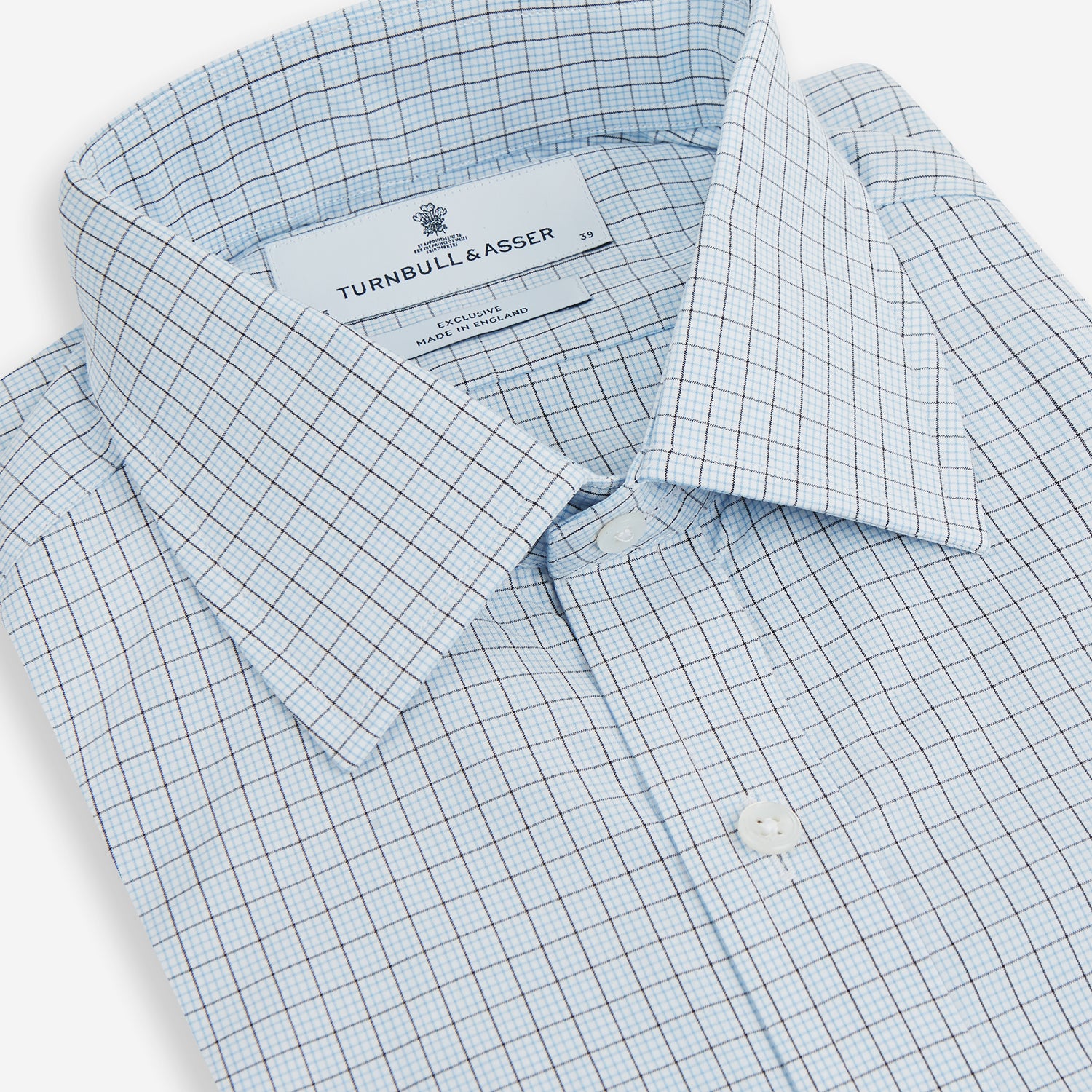 View 2 of product The Blue Multi Graph Check Mayfair Shirt by Turnbull & Asser features long sleeves, a classic T&A collar, chest pocket, and is crafted from breathable cotton, shown on a white background.