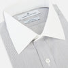 View 2 of product A navy men’s dress shirt with subtle white stripes, crafted from cotton and laid flat on a plain white background; the Striped White on Navy Regular Fit Shirt by Turnbull & Asser UK is a timeless formal piece for any wardrobe.