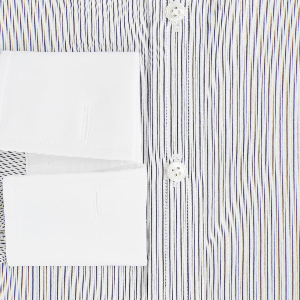 View 4 of product A navy men’s dress shirt with subtle white stripes, crafted from cotton and laid flat on a plain white background; the Striped White on Navy Regular Fit Shirt by Turnbull & Asser UK is a timeless formal piece for any wardrobe.