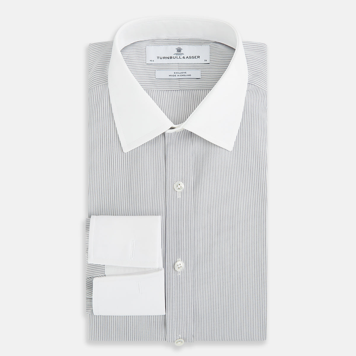 View 5 of product A navy men’s dress shirt with subtle white stripes, crafted from cotton and laid flat on a plain white background; the Striped White on Navy Regular Fit Shirt by Turnbull & Asser UK is a timeless formal piece for any wardrobe.