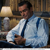 View 2 of product The Turnbull & Asser Dr. No Blue Cotton Shirt with cocktail cuffs, inspired by James Bond, features a classic collar and white buttons, displayed on a plain white background.