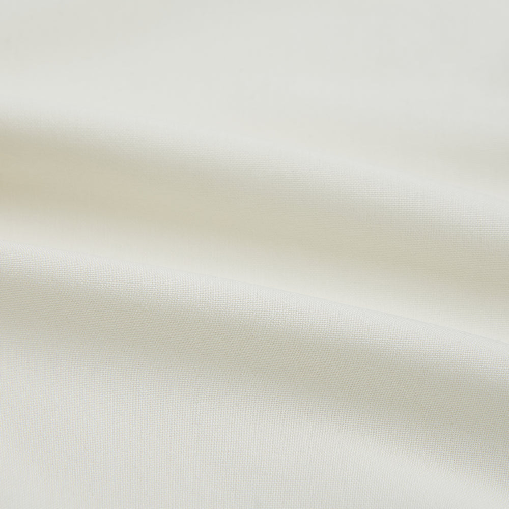The Turnbull & Asser Cream Silk Chelsea Shirt is an elegant white long-sleeve, button-up silk shirt with a single chest pocket, shown against a plain white background.