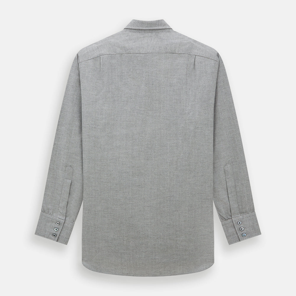 The Turnbull & Asser Grey Herringbone Chelsea Shirt features long sleeves, a chest pocket, classic collar, and buttoned cuffs, adding refined style to smart-casual outfits—shown here against a plain white background.