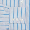View 3 of product The Turnbull & Asser Blue Multi Track Stripe Chelsea Shirt features long sleeves, a light blue multi-stripe design, a chest pocket, open collar, and buttoned cuffs, shown laid flat on a white background.