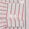 View 3 of product The Turnbull & Asser Red Multi Track Stripe Chelsea Shirt features a classic open collar, long sleeves, red vertical stripes on white, and a left chest pocket—laid flat against a plain background.