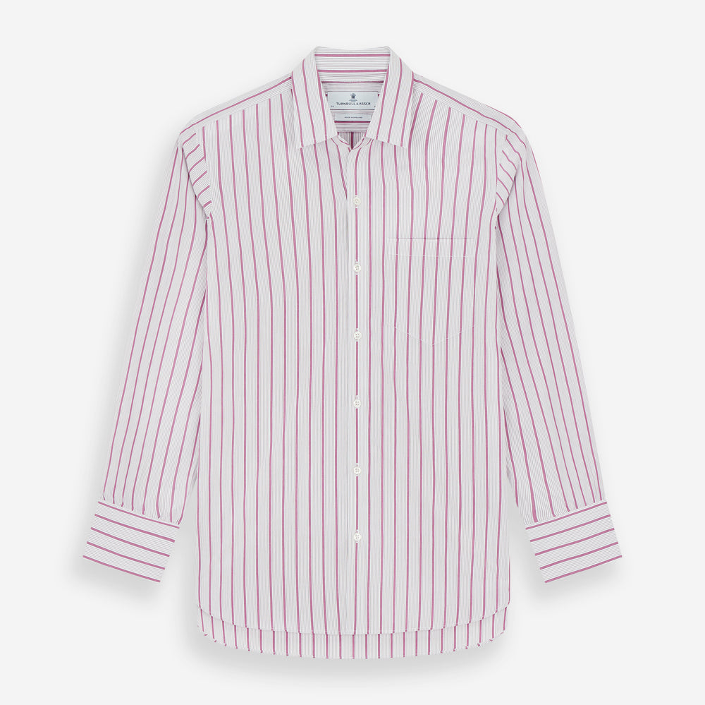 The Purple Multi Track Stripe Chelsea Shirt by Turnbull & Asser features a long-sleeve button-up design with an open Chelsea collar, purple background, vertical multi track stripes, front left pocket, and classic buttoned cuffs.