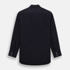 View 3 of product The Turnbull & Asser Navy Twill Chelsea Shirt is a long-sleeve button-up with a collar, front chest pocket, and white buttons, shown against a plain white background.
