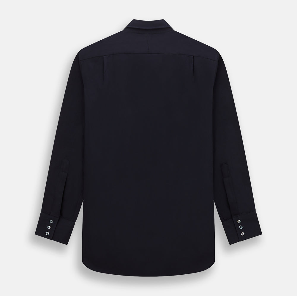 The Turnbull & Asser Navy Twill Chelsea Shirt is a long-sleeve button-up with a collar, front chest pocket, and white buttons, shown against a plain white background.