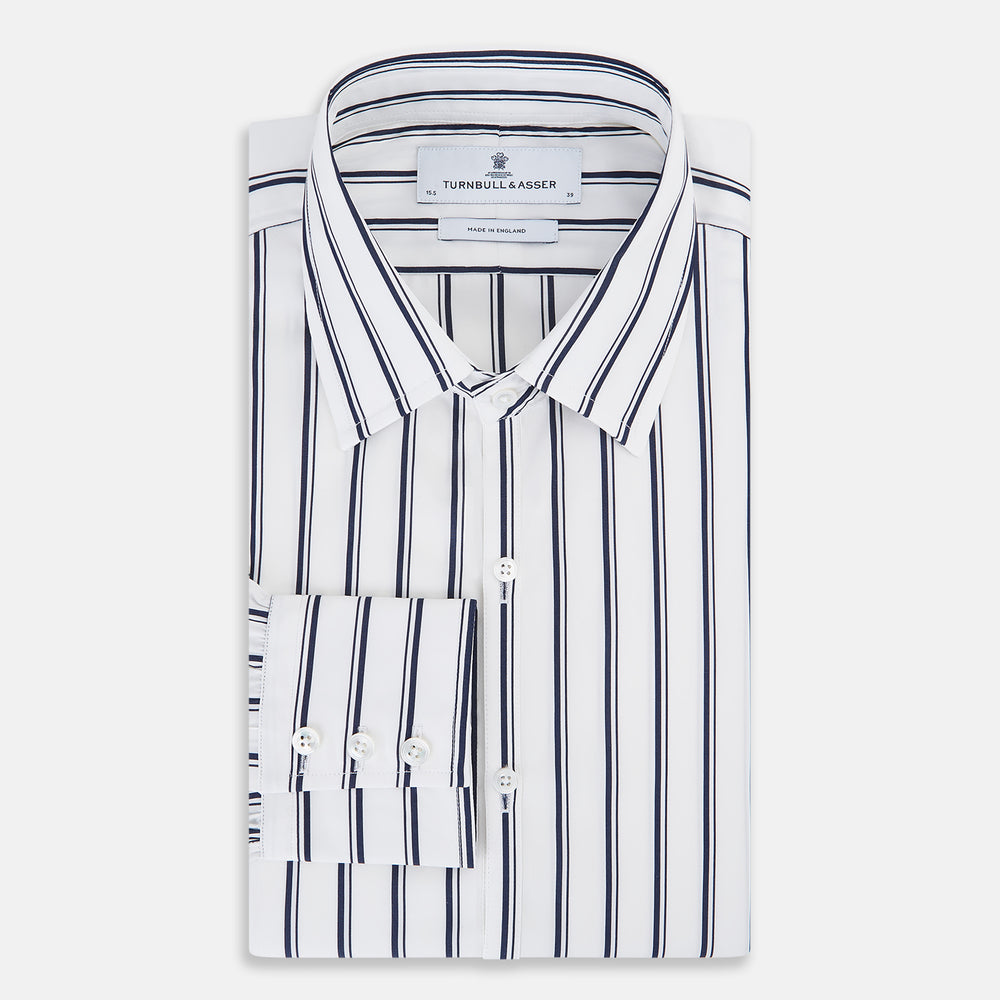The Turnbull & Asser UK NAVY STRIPED COTTON WESTMINSTER SHIRT features long sleeves, a button-down front, pointed collar, and vertical navy stripes on white for classic British style.