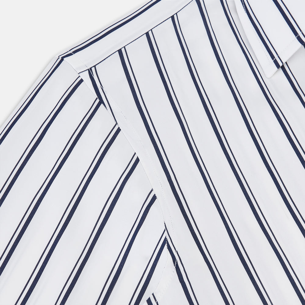The Turnbull & Asser UK NAVY STRIPED COTTON WESTMINSTER SHIRT features long sleeves, a button-down front, pointed collar, and vertical navy stripes on white for classic British style.