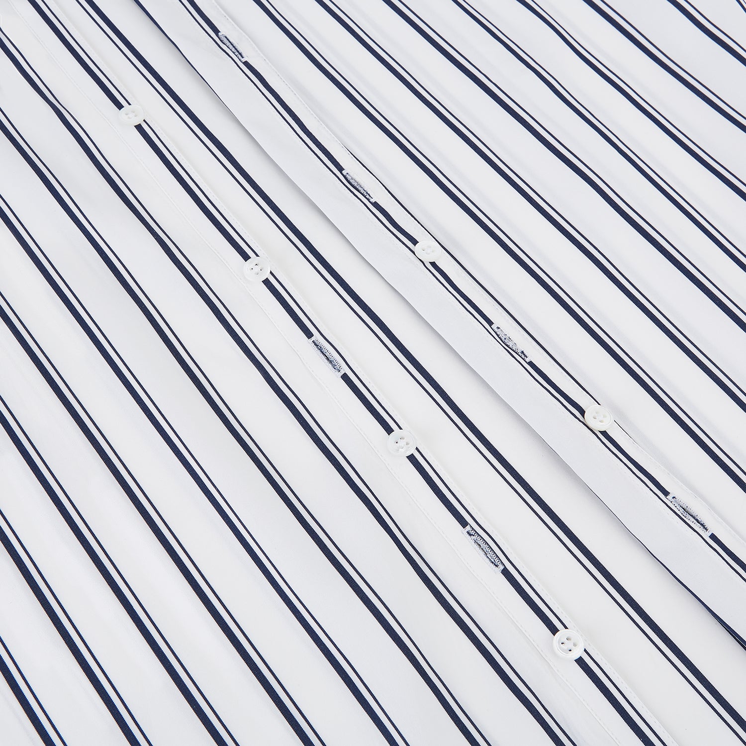 View 7 of product The Turnbull & Asser UK NAVY STRIPED COTTON WESTMINSTER SHIRT features long sleeves, a button-down front, pointed collar, and vertical navy stripes on white for classic British style.