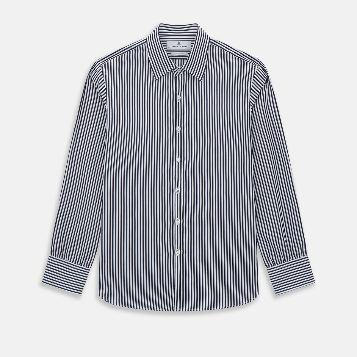 View 1 of product Here is a rewritten version using your product data: A Striped Navy on White Westminster Regular Fit Shirt in Cotton by Turnbull & Asser UK, featuring long sleeves, a button-up front, and a collared neckline with classic vertical stripes. The shirt is neatly laid flat on a white background.