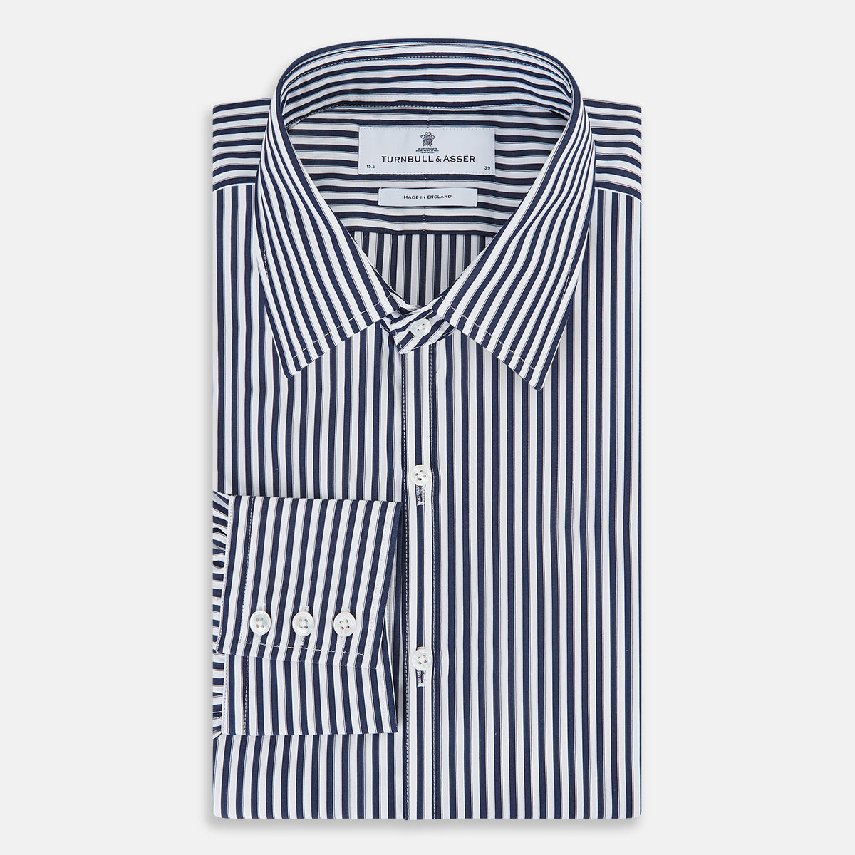 View 5 of product Here is a rewritten version using your product data: A Striped Navy on White Westminster Regular Fit Shirt in Cotton by Turnbull & Asser UK, featuring long sleeves, a button-up front, and a collared neckline with classic vertical stripes. The shirt is neatly laid flat on a white background.