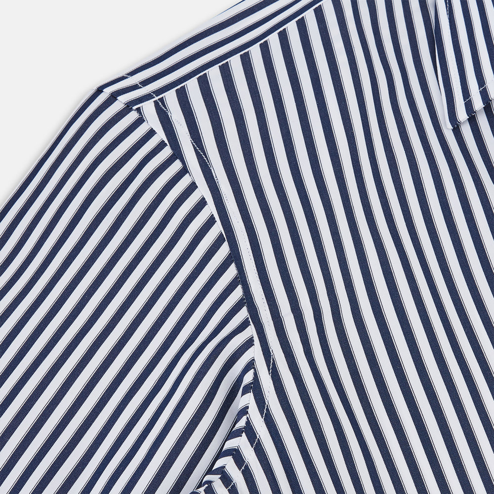 Here is a rewritten version using your product data: A Striped Navy on White Westminster Regular Fit Shirt in Cotton by Turnbull & Asser UK, featuring long sleeves, a button-up front, and a collared neckline with classic vertical stripes. The shirt is neatly laid flat on a white background.