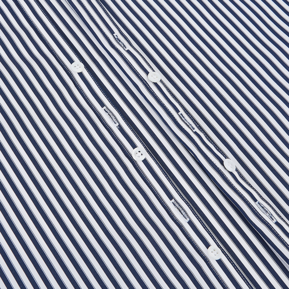 Here is a rewritten version using your product data: A Striped Navy on White Westminster Regular Fit Shirt in Cotton by Turnbull & Asser UK, featuring long sleeves, a button-up front, and a collared neckline with classic vertical stripes. The shirt is neatly laid flat on a white background.
