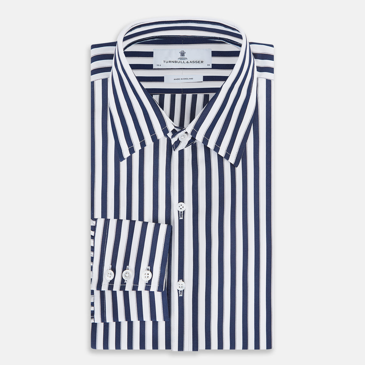 View 4 of product The Striped Navy on White Westminster Regular Fit Shirt in Cotton by Turnbull & Asser UK features vertical navy and white stripes, a classic collar, and buttoned cuffs—a refined example of British shirting, elegantly displayed on a white background.