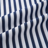 View 7 of product The Striped Navy on White Westminster Regular Fit Shirt in Cotton by Turnbull & Asser UK features vertical navy and white stripes, a classic collar, and buttoned cuffs—a refined example of British shirting, elegantly displayed on a white background.
