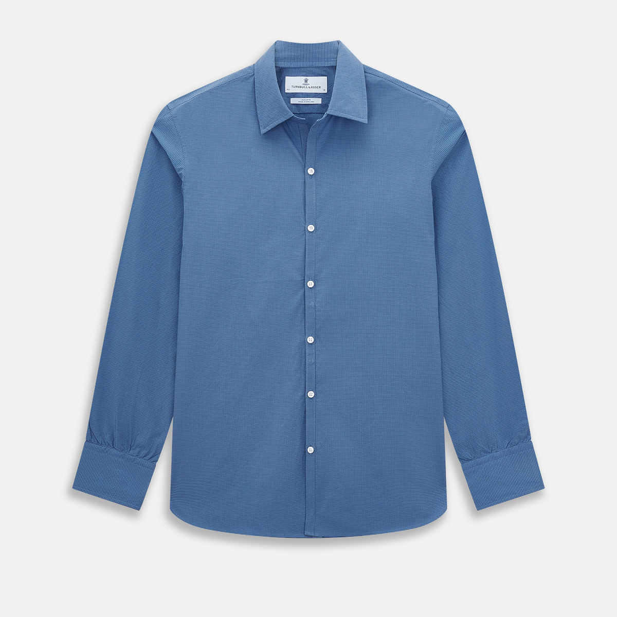 View 1 of product A Colony Blue Pin Check Windsor Shirt by Turnbull & Asser UK, featuring long sleeves, white buttons, a classic Turnbull collar, and buttoned cuffs—expertly crafted in Britain and displayed flat on a white background.