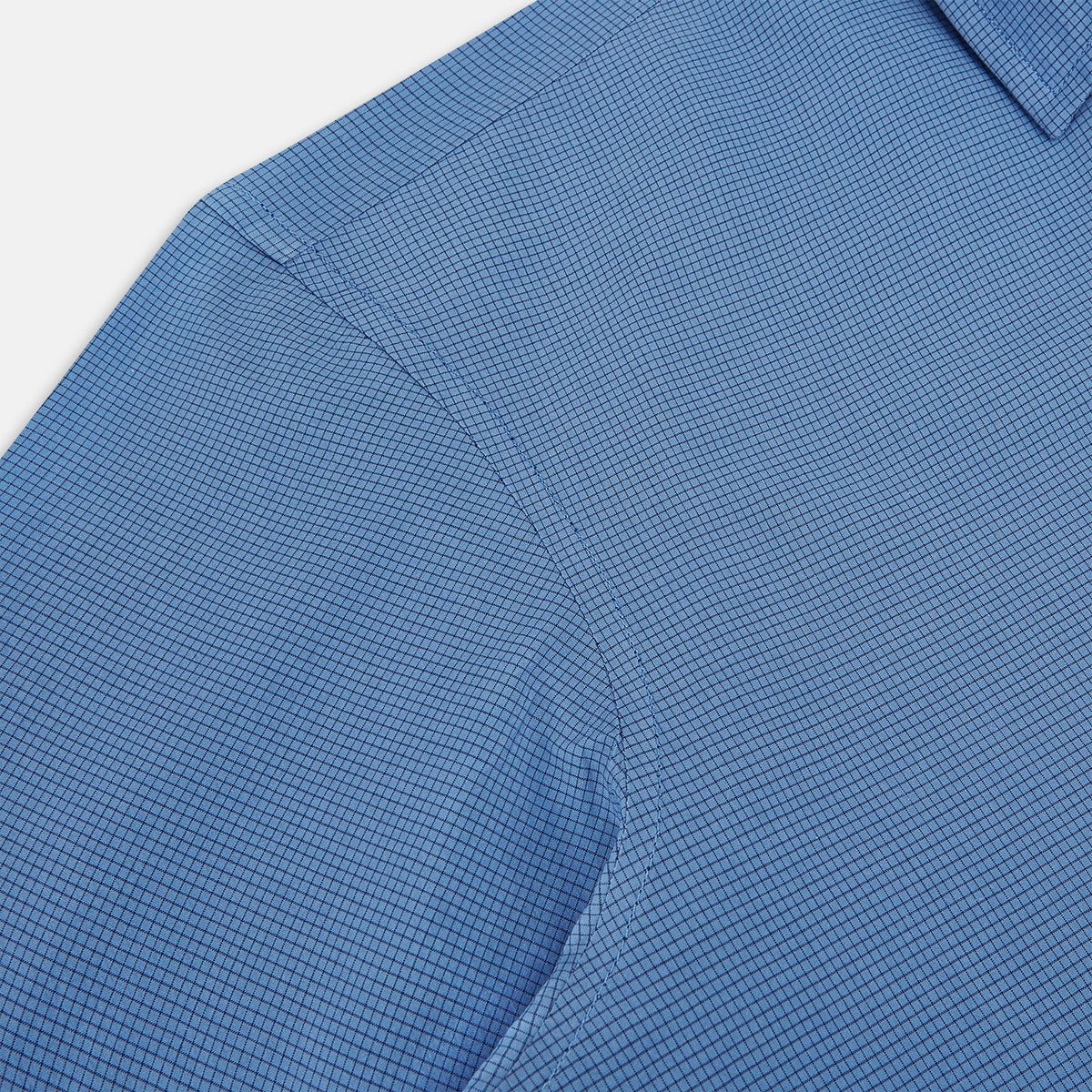 View 6 of product A Colony Blue Pin Check Windsor Shirt by Turnbull & Asser UK, featuring long sleeves, white buttons, a classic Turnbull collar, and buttoned cuffs—expertly crafted in Britain and displayed flat on a white background.