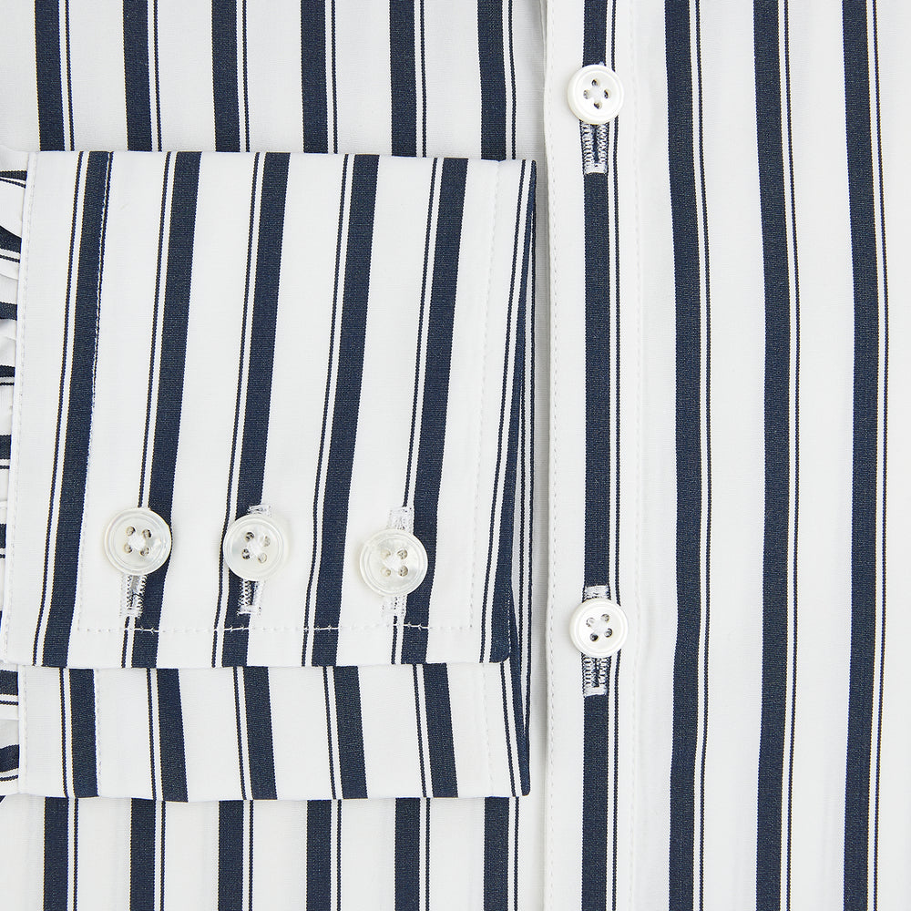 A long-sleeve men’s dress shirt by Turnbull & Asser UK—named SHIRTS RF WINDSOR OPEN CLR BC NAVY STRIPE ON WHTE—featuring classic Windsor open collar styling and navy vertical stripes on a white background, shown on a plain white surface.