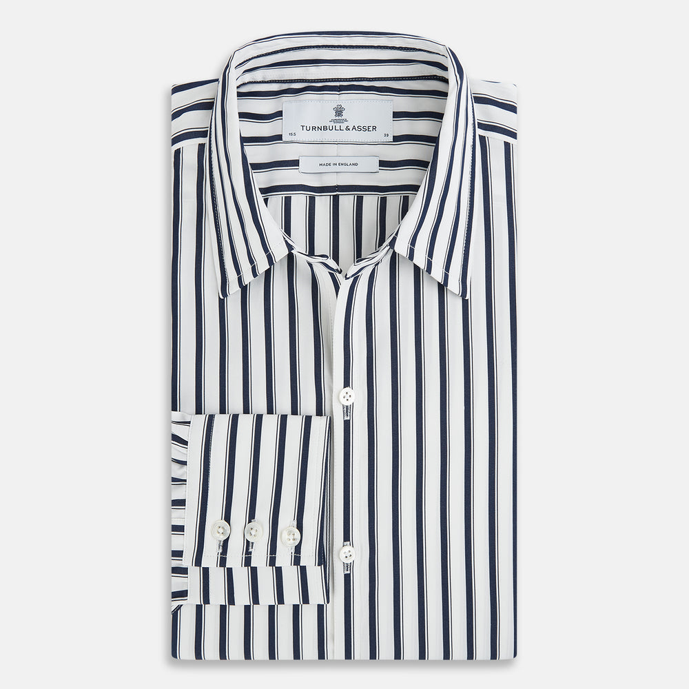 A long-sleeve men’s dress shirt by Turnbull & Asser UK—named SHIRTS RF WINDSOR OPEN CLR BC NAVY STRIPE ON WHTE—featuring classic Windsor open collar styling and navy vertical stripes on a white background, shown on a plain white surface.
