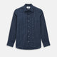 The Turnbull & Asser UK White Check on Navy Windsor Shirt features an open collar, button cuffs, and cuffed long sleeves. Showcased against a white background, this shirt presents a navy base adorned with a white grid pattern.