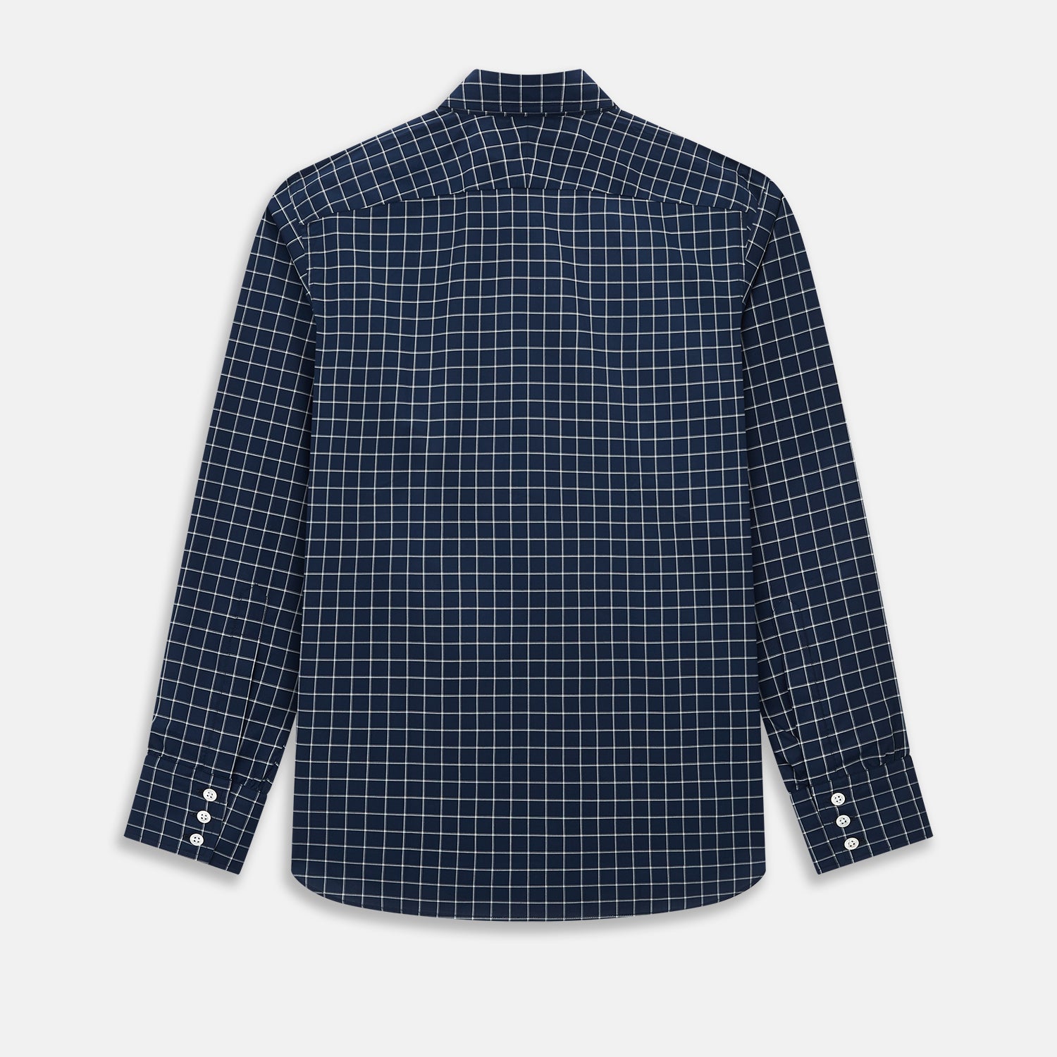 View 3 of product The Turnbull & Asser UK White Check on Navy Windsor Shirt features an open collar, button cuffs, and cuffed long sleeves. Showcased against a white background, this shirt presents a navy base adorned with a white grid pattern.