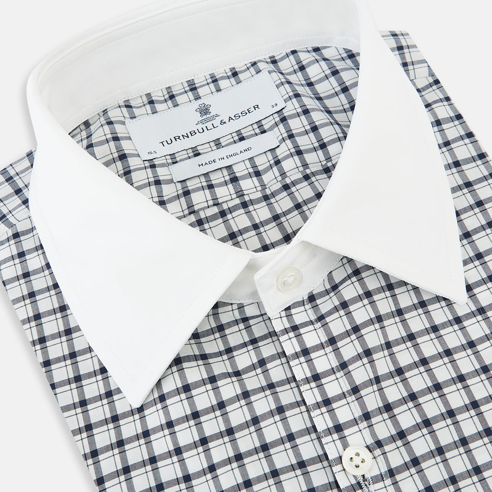 Turnbull & Asser UK Westminster Double-Track Check Navy Closed Collar Regular Fit Shirt in Cotton featuring a long-sleeve button-up design in a navy and white check pattern, complete with a white collar and white cuffs.