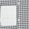 View 4 of product Turnbull & Asser UK Westminster Double-Track Check Navy Closed Collar Regular Fit Shirt in Cotton featuring a long-sleeve button-up design in a navy and white check pattern, complete with a white collar and white cuffs.