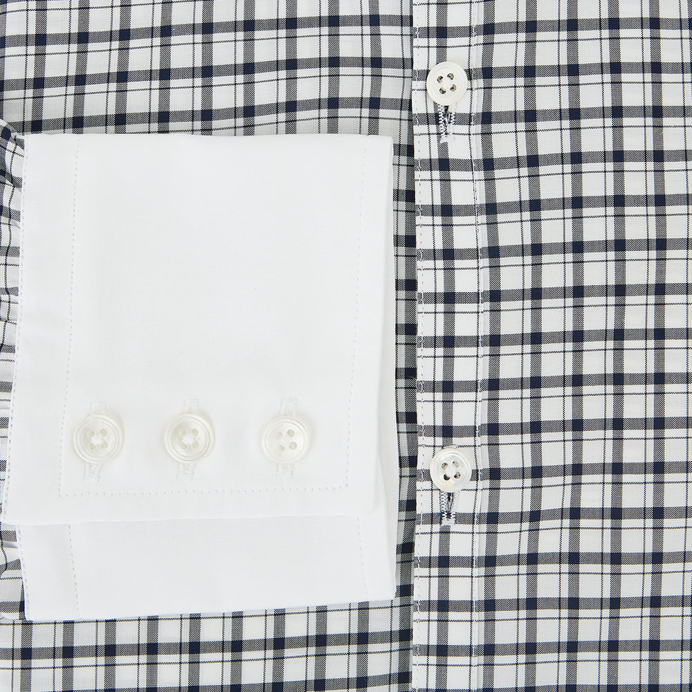Turnbull & Asser UK Westminster Double-Track Check Navy Closed Collar Regular Fit Shirt in Cotton featuring a long-sleeve button-up design in a navy and white check pattern, complete with a white collar and white cuffs.