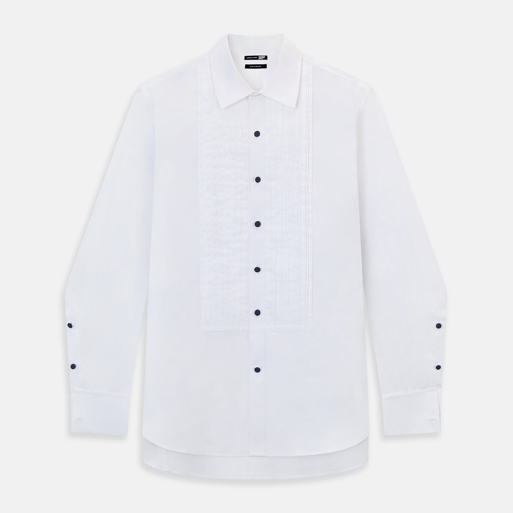 The Casino Royale White Dress Shirt in Cotton by Turnbull & Asser UK is a long-sleeve white dress shirt, crafted from crisp white cotton poplin with a pleated bib front, black buttons, and a classic collar, shown laid flat on a white background.