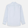 View 3 of product The Turnbull & Asser Tailored Fit Light Blue Cotton Shirt features a Kent collar, buttoned front, and 3-button cuffs, ideal for pairing with a navy suit and shown laid flat on a white background.