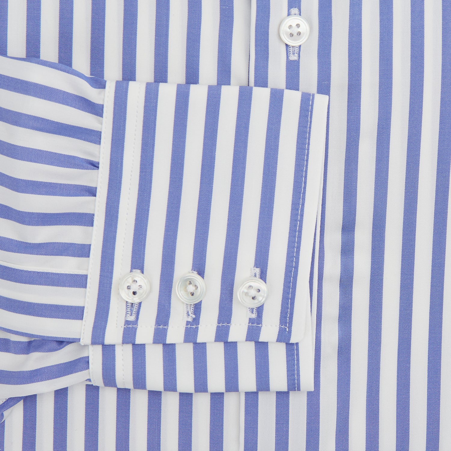 View 4 of product A Tailored Fit Blue and White Candy Stripe Shirt with Kent collar and 3-button cuffs by Turnbull & Asser, featuring the brand's label inside the collar.