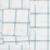 View 4 of product The Turnbull & Asser UK Large Checked Sage on White Tailored Fit Shirt in Cotton features white, long sleeves and button-up styling with a subtle sage check and light gray windowpane plaid pattern, neatly laid flat against a white background.