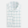 View 6 of product The Turnbull & Asser UK Large Checked Sage on White Tailored Fit Shirt in Cotton features white, long sleeves and button-up styling with a subtle sage check and light gray windowpane plaid pattern, neatly laid flat against a white background.