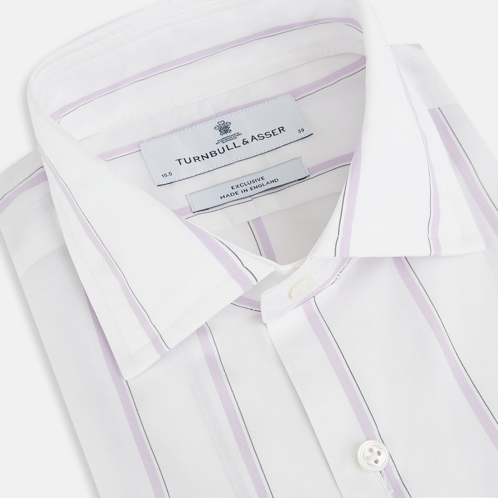 Track Striped Pink on White Tailored Fit Shirt in Cotton by Turnbull & Asser UK, featuring thin vertical pink stripes on white cotton, a classic collar, slim tailored fit, and buttoned cuffs, displayed on a plain white background.