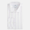 View 5 of product Track Striped Pink on White Tailored Fit Shirt in Cotton by Turnbull & Asser UK, featuring thin vertical pink stripes on white cotton, a classic collar, slim tailored fit, and buttoned cuffs, displayed on a plain white background.