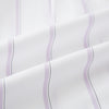 View 6 of product Track Striped Pink on White Tailored Fit Shirt in Cotton by Turnbull & Asser UK, featuring thin vertical pink stripes on white cotton, a classic collar, slim tailored fit, and buttoned cuffs, displayed on a plain white background.