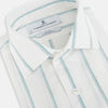 View 2 of product Track Striped Sage on White Tailored Fit Shirt in Cotton by Turnbull & Asser UK, featuring light blue vertical stripes, a classic collar, and cuffed long sleeves, displayed laid flat against a plain white background.