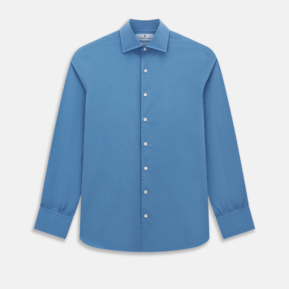 View 1 of product The Turnbull & Asser UK SHIRTS NEW TF KENT CLR 3BC COLONY BLUE/NAVY STRIPE is a long-sleeve button-up dress shirt featuring a pointed Kent collar, white buttons, and buttoned cuffs, shown against a plain white background.