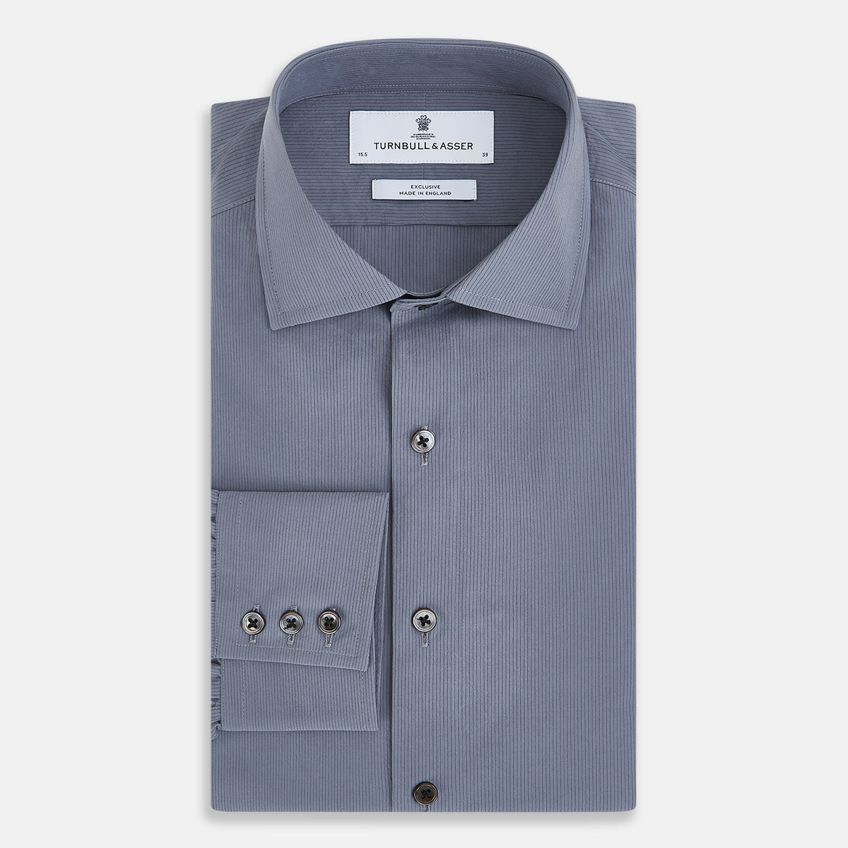 View 5 of product A long-sleeve, button-up men’s dress shirt by Turnbull & Asser UK, the SHIRTS NEW TF KENT CLR 3BC GRAY/NAVY STRIPE, featuring a pointed Kent collar and buttoned cuffs in a gray and navy stripe pattern, displayed against a plain white background.