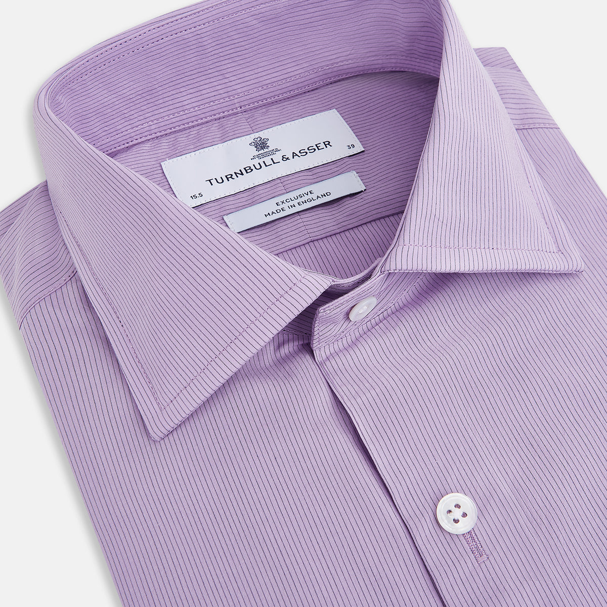 View 2 of product A long-sleeved, button-up Pinstriped Baby Pink Tailored Fit Shirt in Cotton with a kent collar from Turnbull & Asser UK, displayed on a white background.