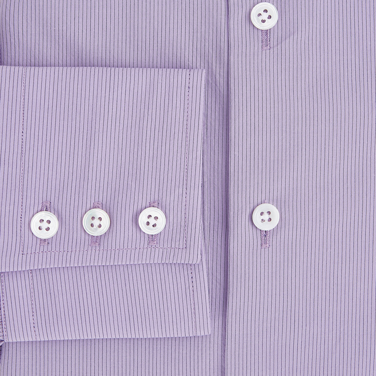 View 4 of product A long-sleeved, button-up Pinstriped Baby Pink Tailored Fit Shirt in Cotton with a kent collar from Turnbull & Asser UK, displayed on a white background.