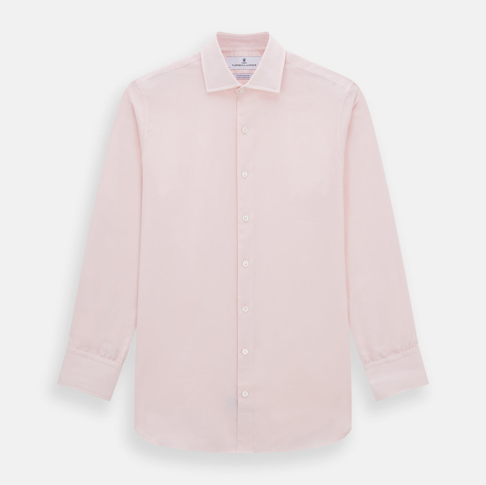 The Turnbull & Asser Tailored Fit Pale Pink Cotton Cashmere Belgravia Shirt features long sleeves and a collar for a formal look, shown flat against a white background.