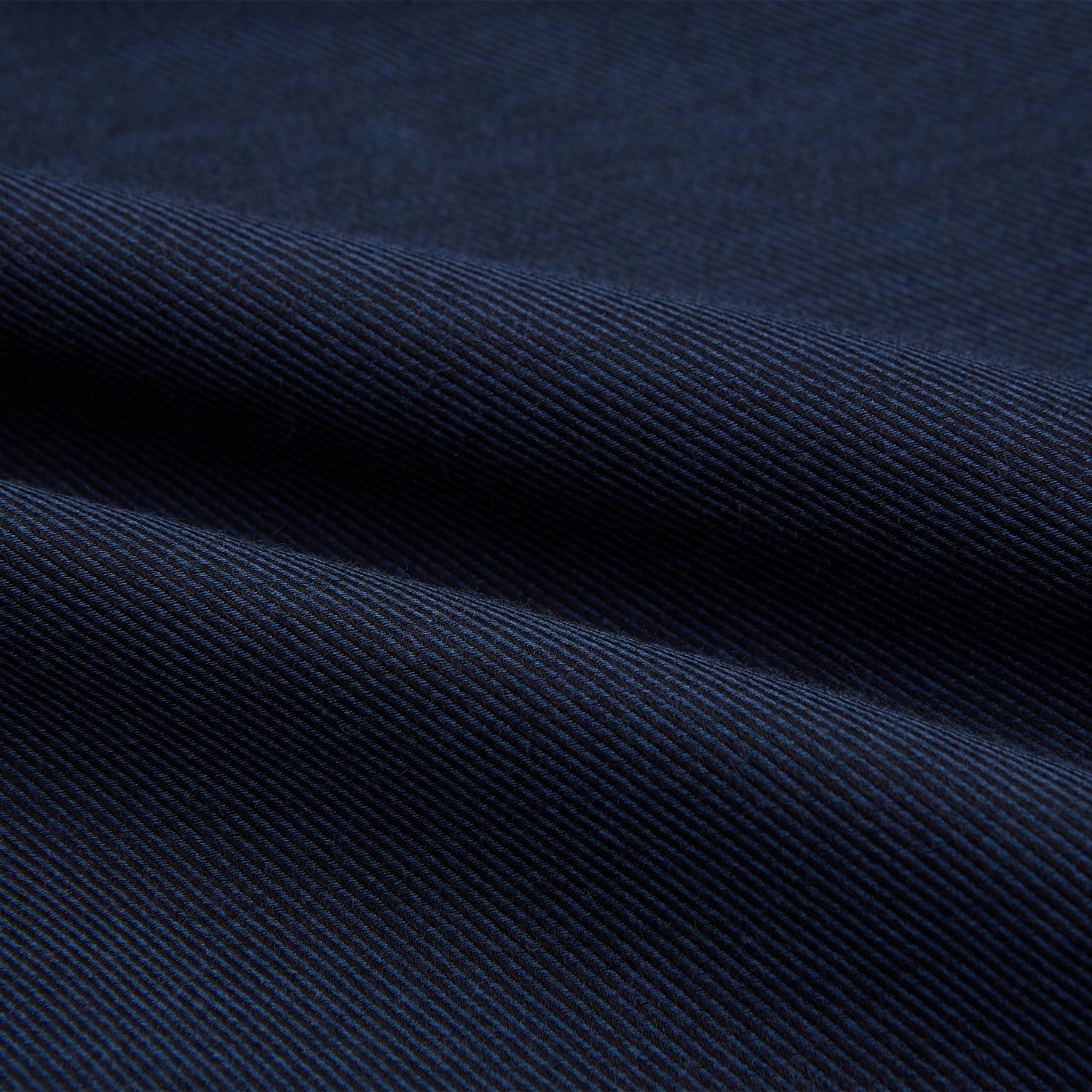 View 6 of product The Turnbull & Asser Tailored Fit Navy Cotton Cashmere Belgravia Shirt features a classic collar, white buttons, and long sleeves, shown on a white background.