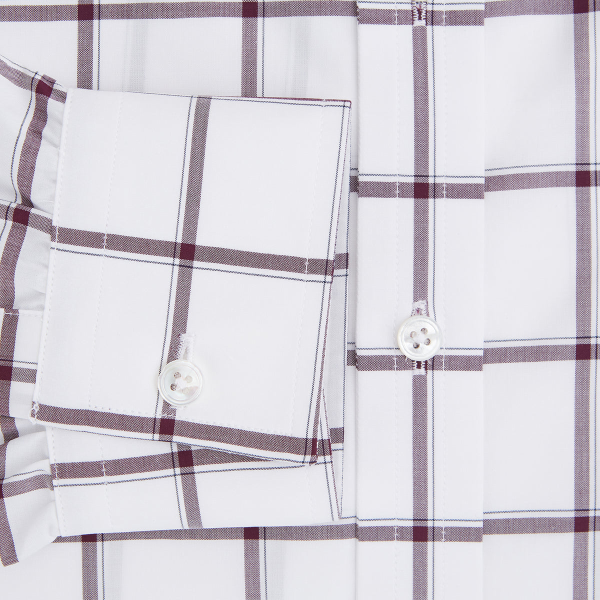 View 4 of product A Turnbull & Asser UK SHIRTS WF DERBY COLLAR 1BC 1PKT WHT/BURG MULTI CHK—a long-sleeve, button-up shirt in white with a burgundy multi-check pattern, featuring a classic derby collar and a single front pocket on the left side.