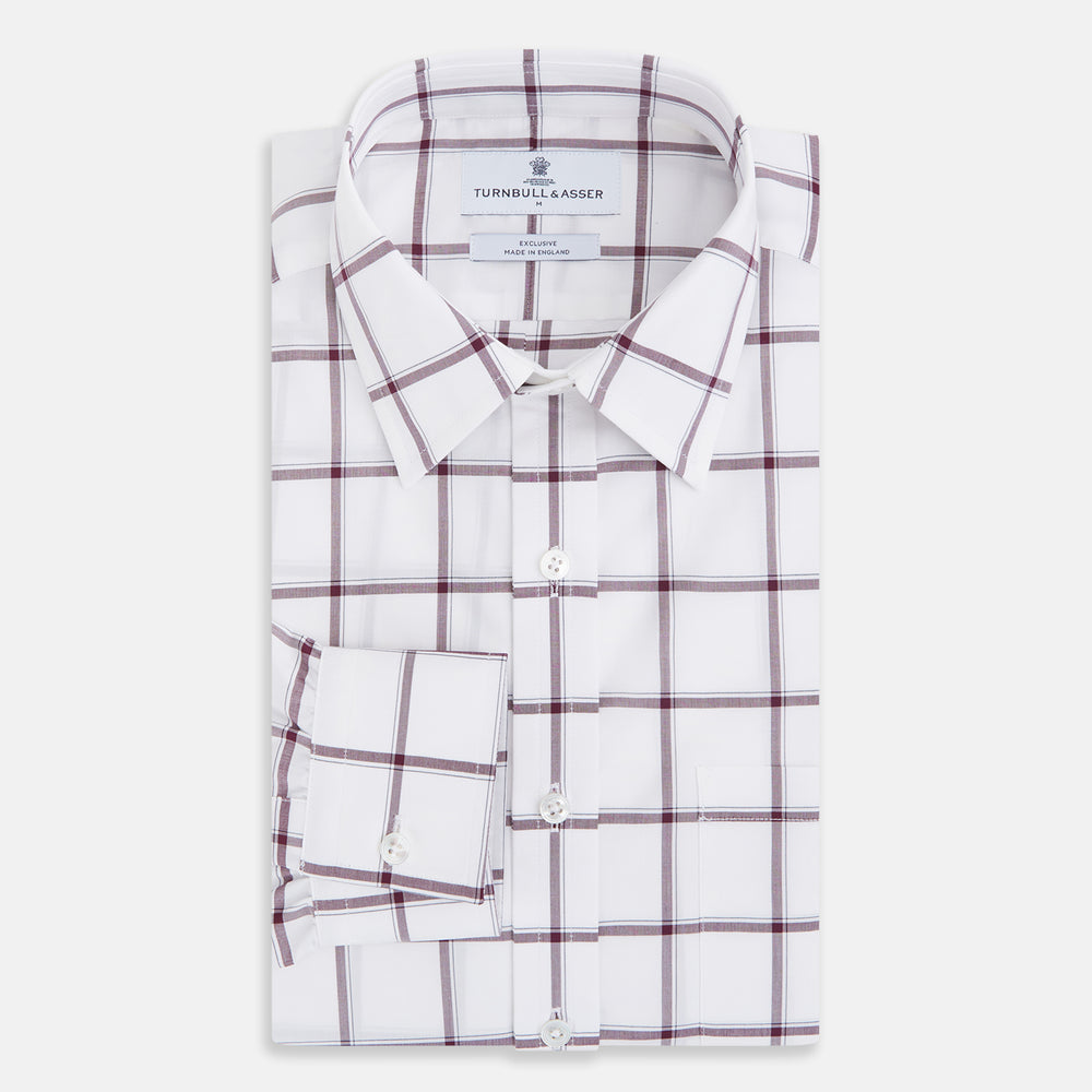 A Turnbull & Asser UK SHIRTS WF DERBY COLLAR 1BC 1PKT WHT/BURG MULTI CHK—a long-sleeve, button-up shirt in white with a burgundy multi-check pattern, featuring a classic derby collar and a single front pocket on the left side.