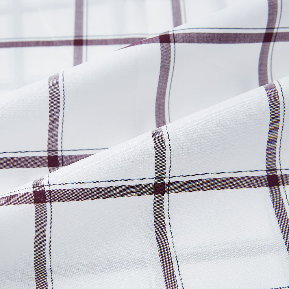 A Turnbull & Asser UK SHIRTS WF DERBY COLLAR 1BC 1PKT WHT/BURG MULTI CHK—a long-sleeve, button-up shirt in white with a burgundy multi-check pattern, featuring a classic derby collar and a single front pocket on the left side.